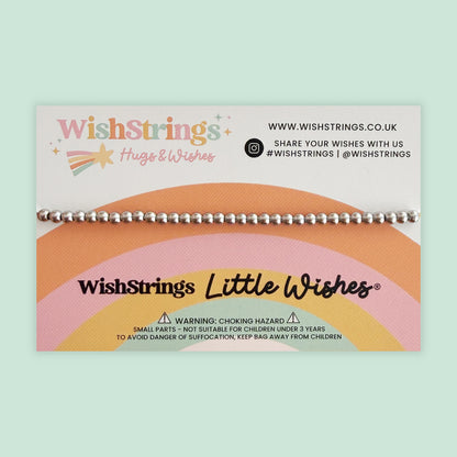 The image is a bracelet with a colorful design and text that reads "WishStrings Little Wishes".