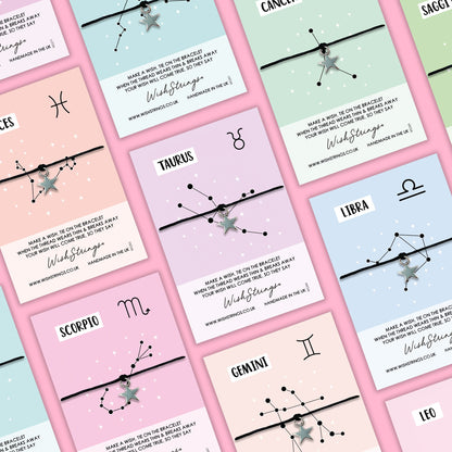 a series of business cards with zodiac signs on them
